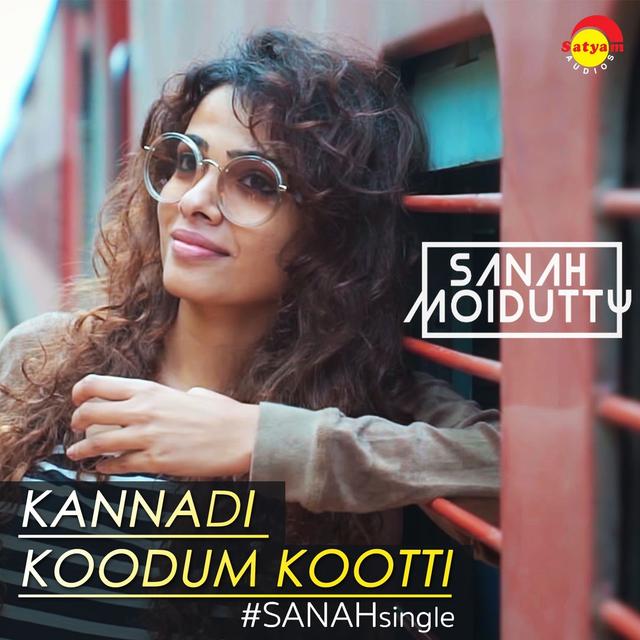 Album cover art for Kannadi Koodum Kootti