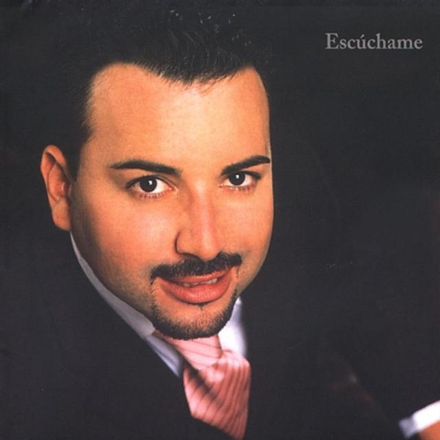 Album cover art for Escúchame