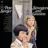 Album cover art for Strangers and Cousins: Songs from His World Tour