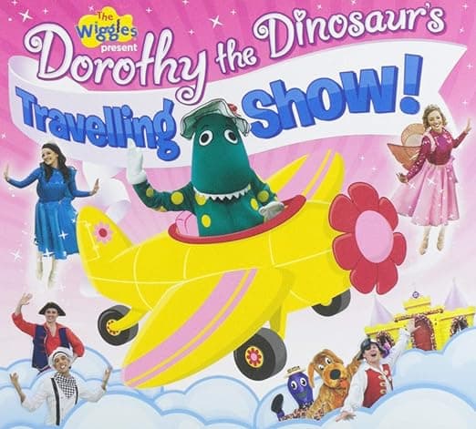 Album cover art for The Wiggles Present Dorothy the Dinosaur's Travelling Show!
